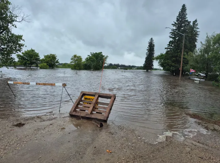 CBC: The main road into Togo was left inaccessible by heavy rains across east central Saskatchewan. (Submitted by Rita Brock)