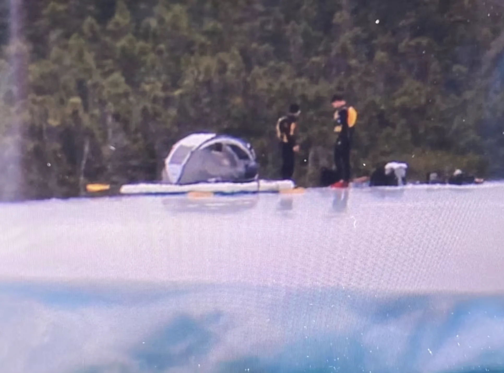 CBC: Two unidentified campers were seen atop an iceberg — a rare occurrence in Newfoundland — near Twillingate earlier this week. (Submitted by Sarah Rice)