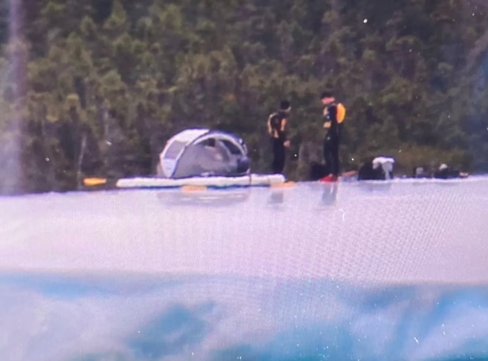 CBC: Two unidentified campers were seen atop an iceberg — a rare occurrence in Newfoundland — near Twillingate earlier this week. (Submitted by Sarah Rice)