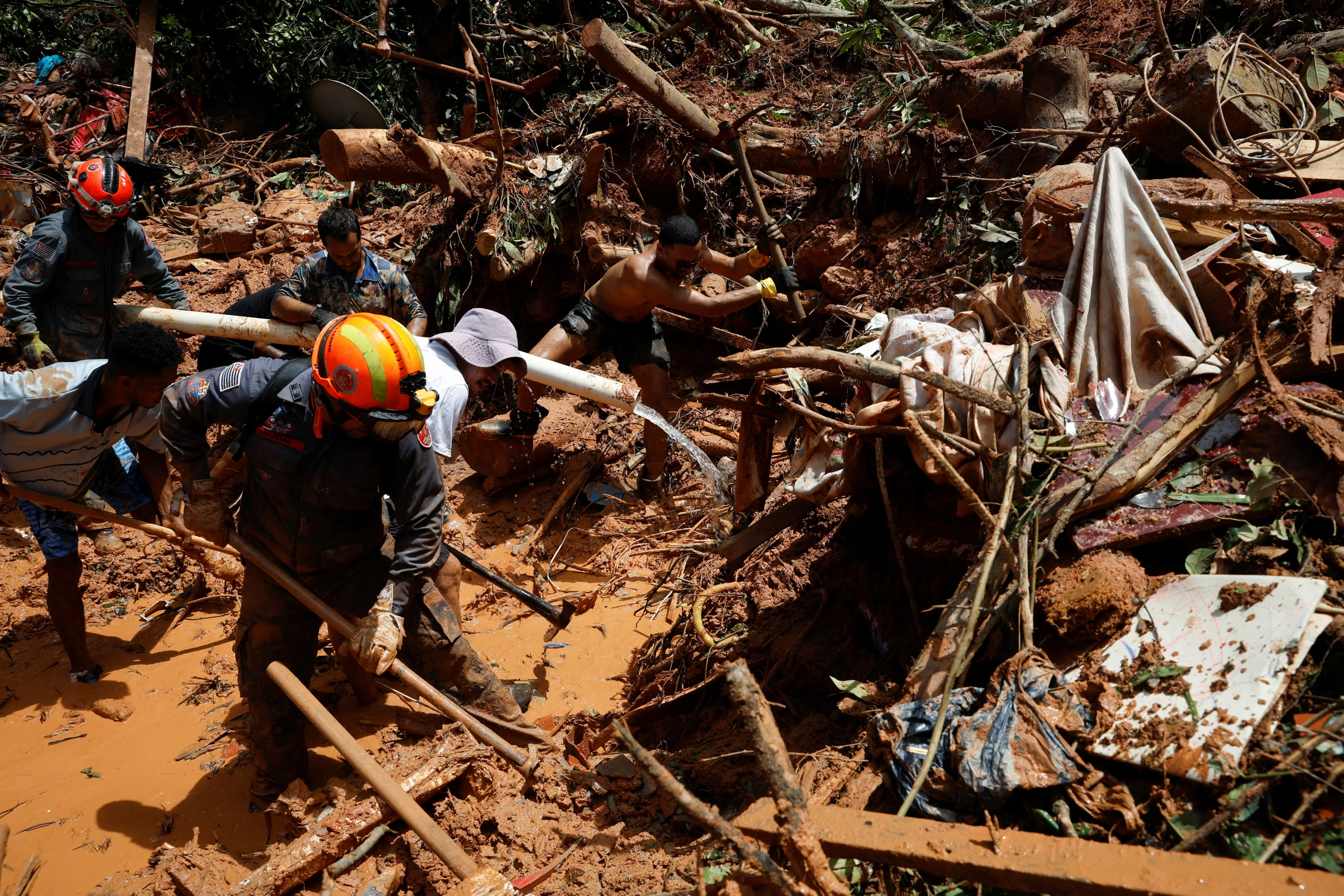 Reuters:  One of the landslides sites after severe rainfall at Barra do Sahy in Sao Sebastiao, Brazil, February 21, 2023. REUTERS/Amanda Perobelli