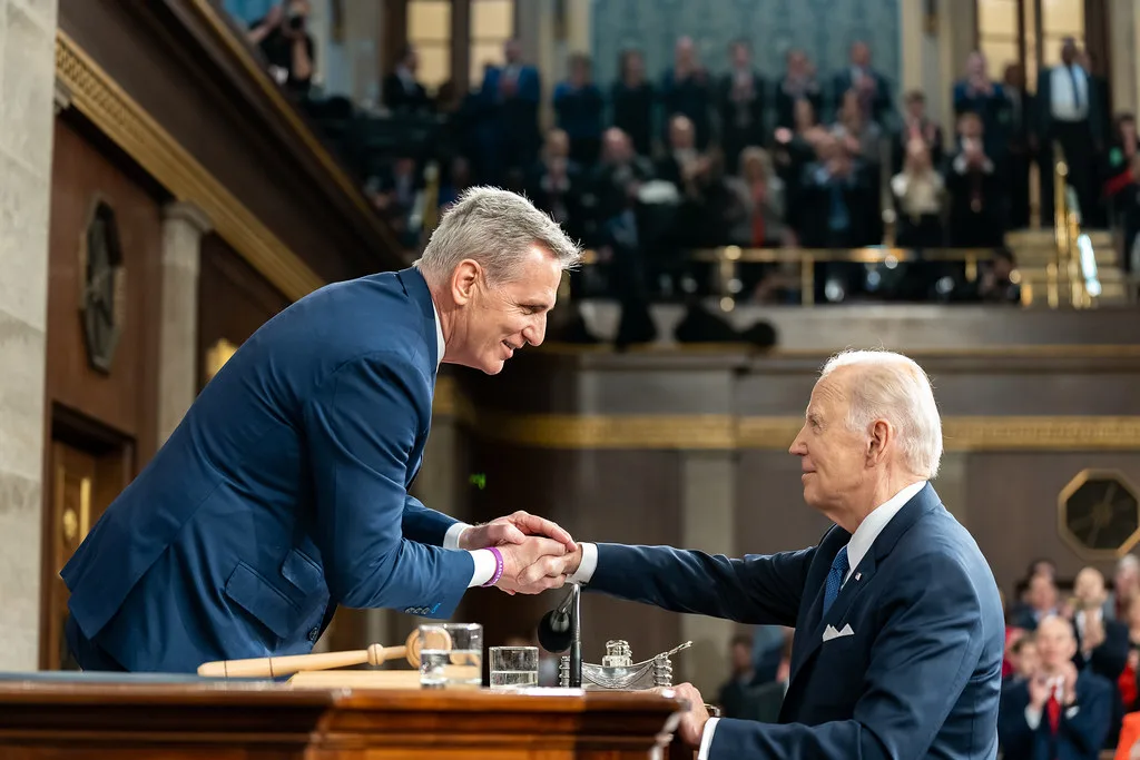 (WHITE HOUSE) President Joe Biden shakes hands with House Speaker Kevin McCarthy