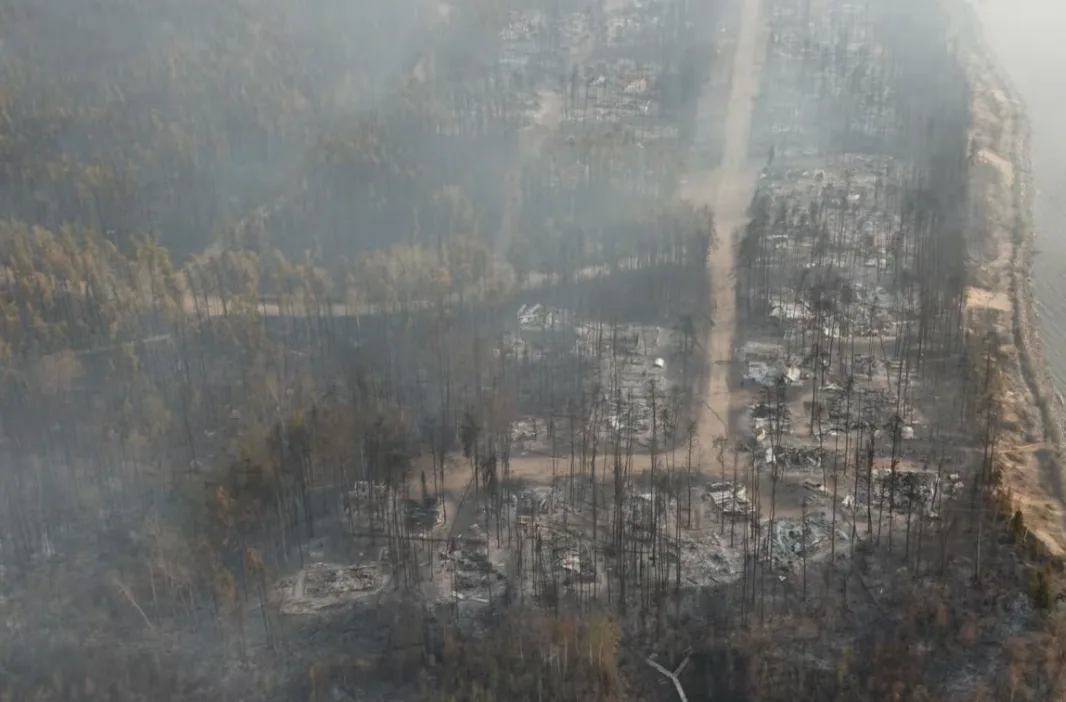 Drone footage shows the burned remains of cabins at East Trout Lake - Saskatchewan Public Safety Agency
