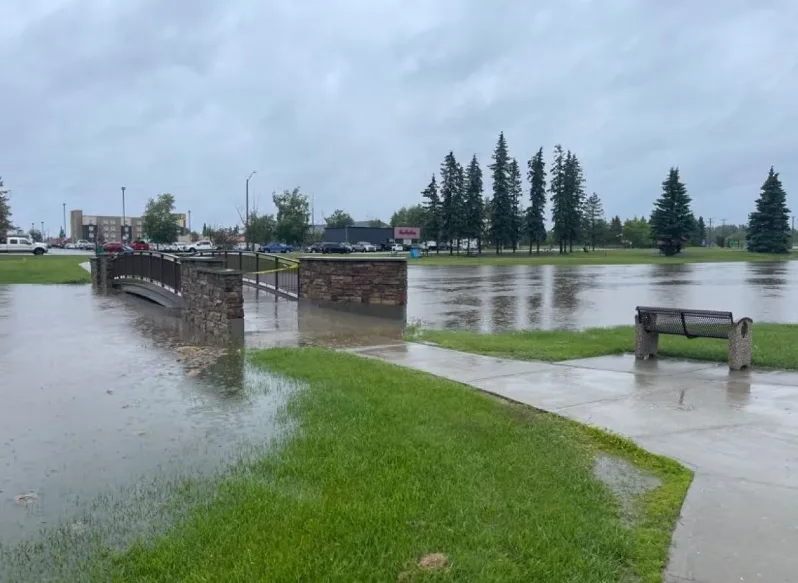 Flooding follows fire in central Alberta as fire evacuees prepare to ...