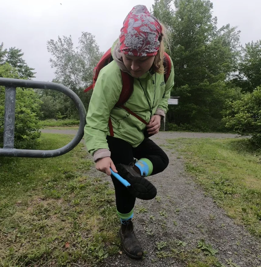 CBC: The invasive species council has a campaign called 'play, clean, grow' which Elton, pictured here at Kouchibouguac National Park, says encourages people to clean off the treads of their footwear or get rid of any seeds stuck to them after walking on trails. (Submitted by New Brunswick Invasive Species Council)