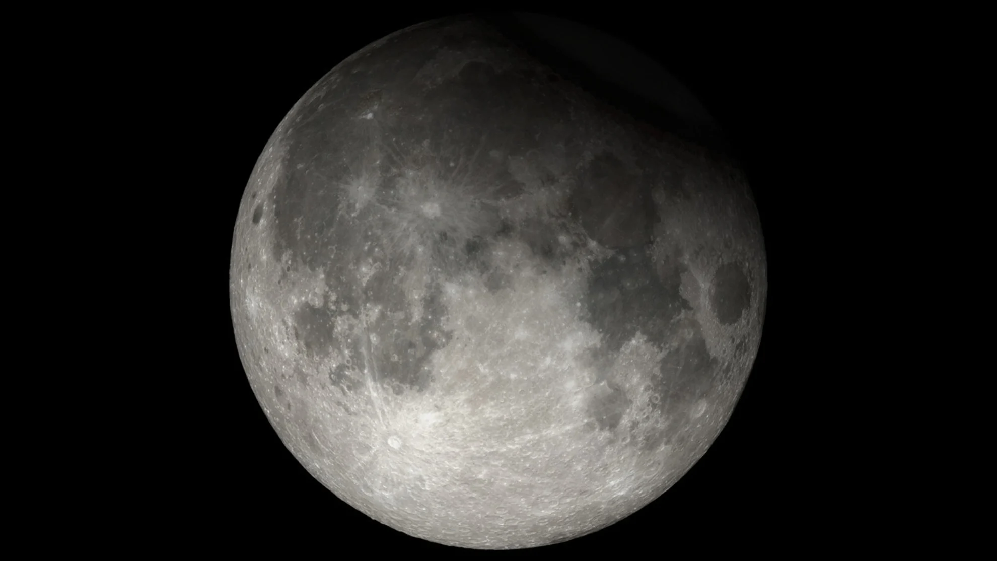 Eyes up! A partial lunar eclipse will grace our night sky tonight. HERE's what you need to know