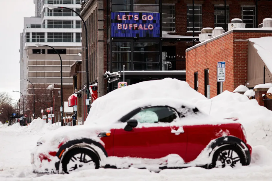 Buffalo digs out from deadly blizzard; warming could bring rain, slush
