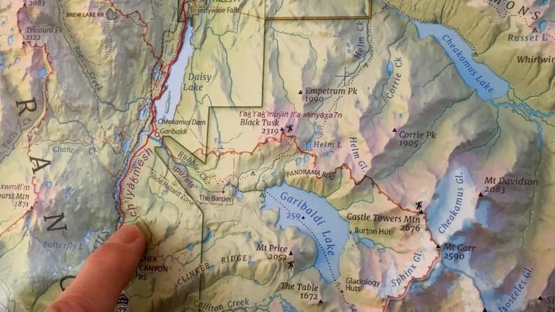 CBC Using yellow and lavender colours, Jeff Clark highlights the mountains and adds in the essential information he wants to share. (Alanna Kelly/CBC)