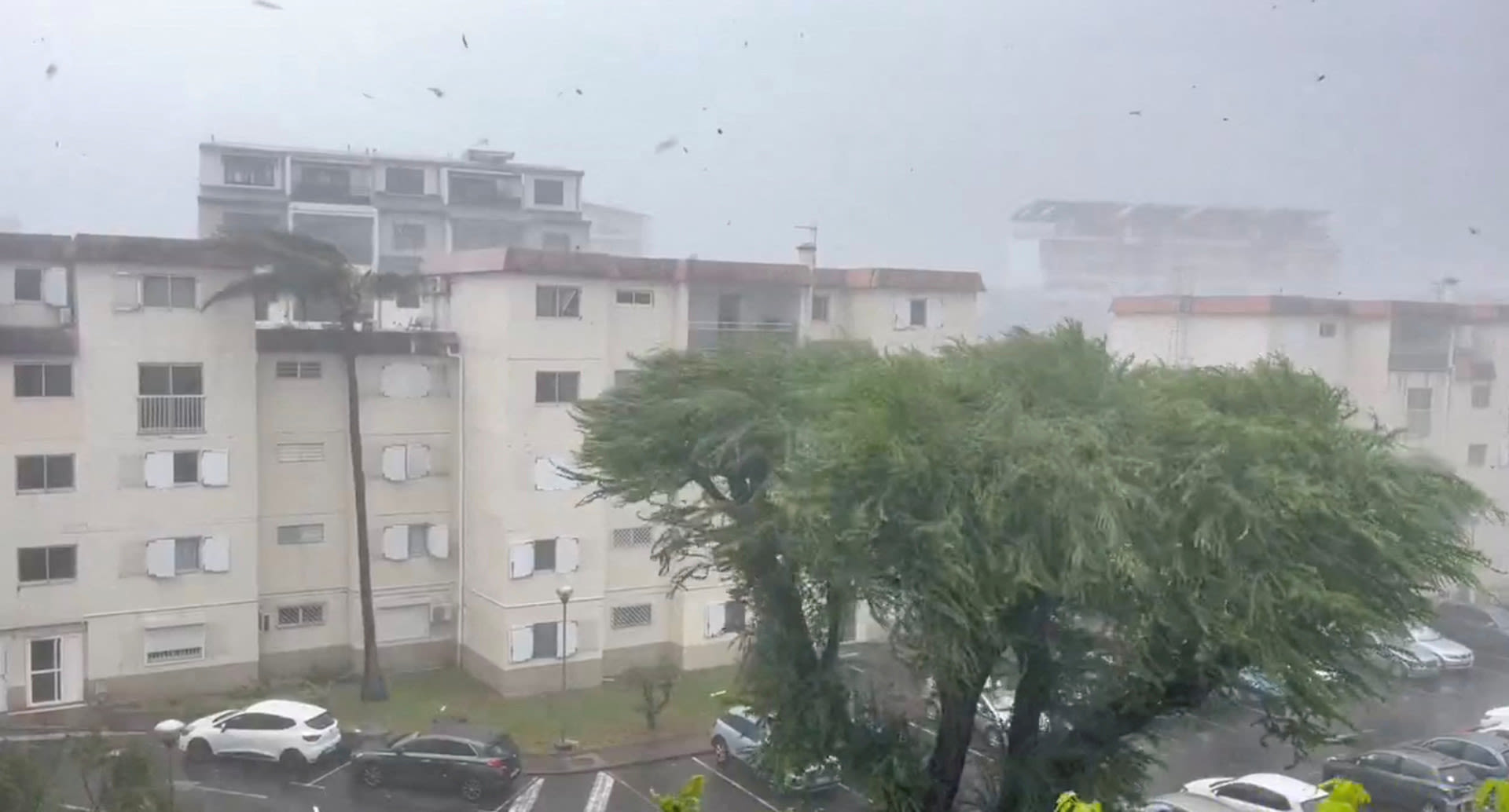 One dead, two missing as cyclone Garance hits French island of La Réunion