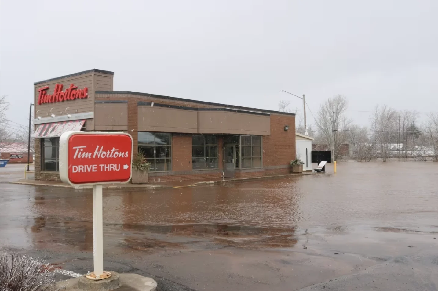 CBC: The Tim Hortons in Sussex was surrounded by pooling water. (Julia Wright/CBC)
