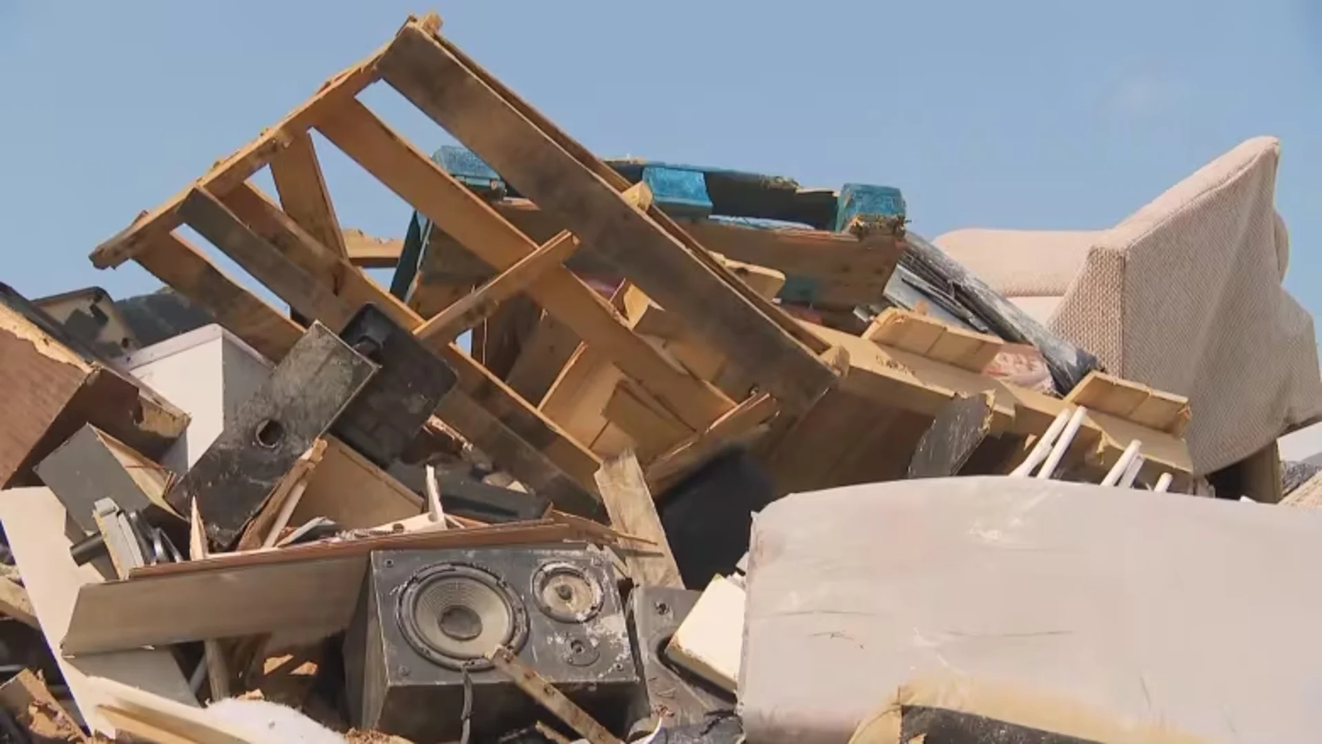 Quebec cities overwhelmed by waste after torrential rains flooded basements