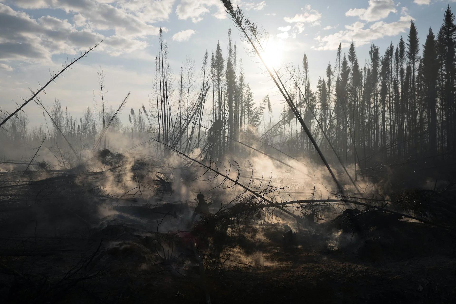 Human activities are fuelling wildfires that burn carbon-sequestering peatlands
