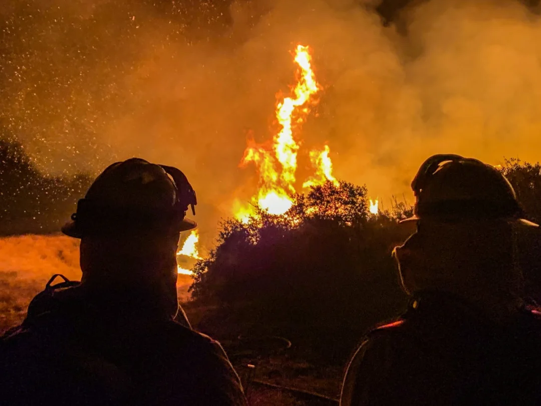 Raging wildfires destroy Washington town, roar through California, Oregon
