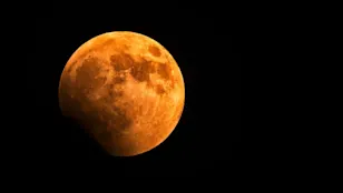 In Photos: Stunning views of the rare Pi Day "Blood Moon" Lunar Eclipse