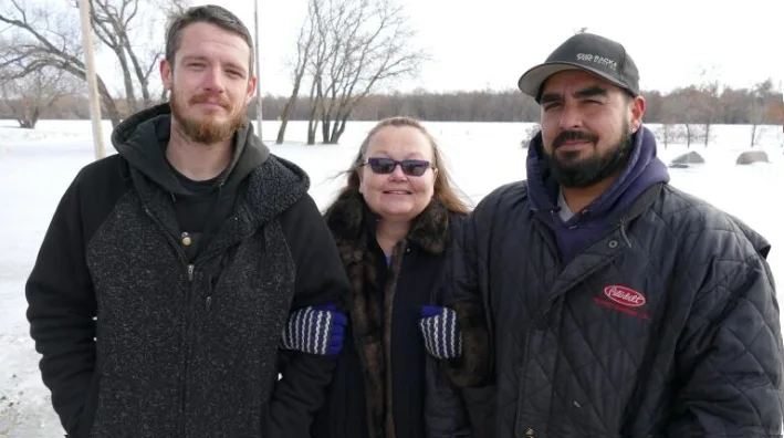 'Guardian angel' roofers save woman from drowning in icy Red River