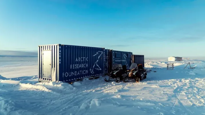 This greenhouse in a sea can in Nunavut is powered by wind and solar energy