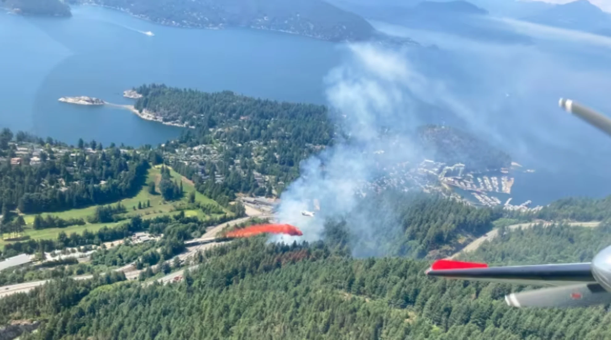 Sea-to-Sky Hwy reopens to southbound traffic as crews hold grass fire