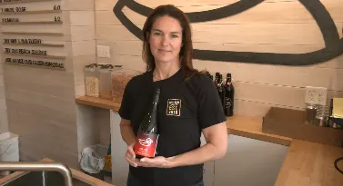 Photos by Nathan Coleman taken in Dartmouth, NS showing Poet Comeau/ Nova Scotia Cider Association President holding a bottle of Red Sky.