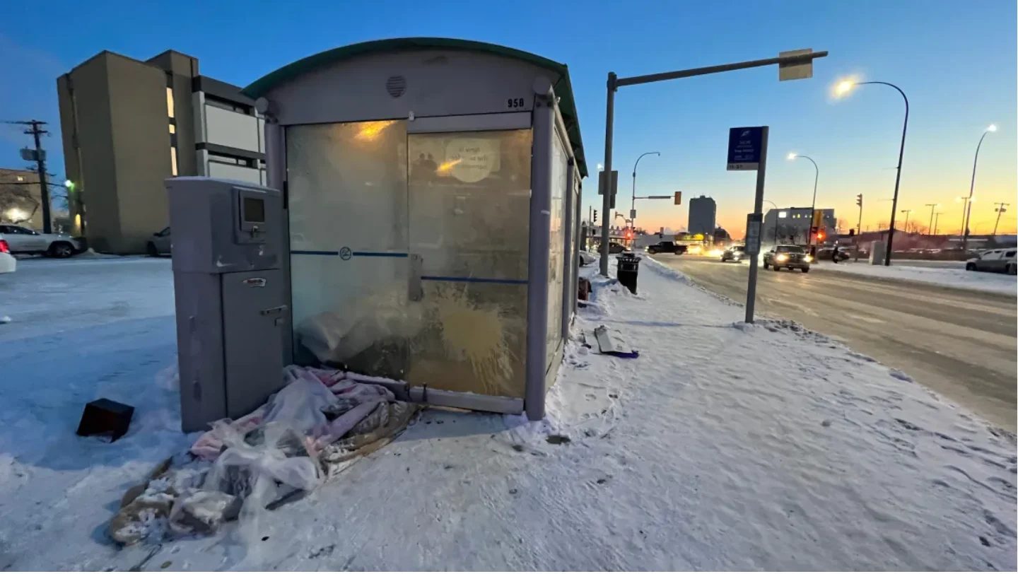 CBC: The woman was found inside this bus shelter at corner of Tache Avenue and Goulet Street in Winnipeg's St. Boniface neighbourhood on Dec. 5, 2022. (Travis Golby/CBC)