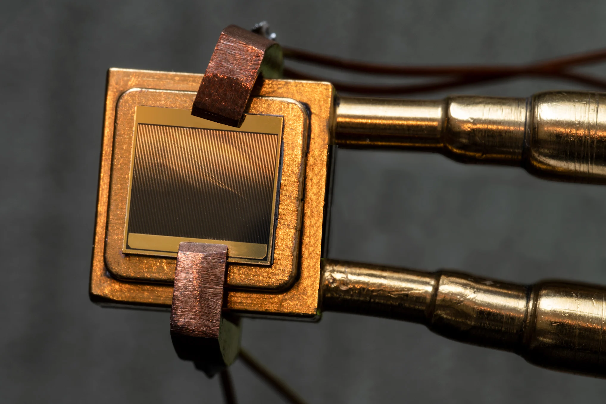 Researchers at MIT and the National Renewable Energy Laboratory (NREL) plan to incorporate a thermophotovoltaic (TPV) cell, similar to a solar panel’s photovoltaic cells, into a grid-scale thermal battery. (Felice Frankel)