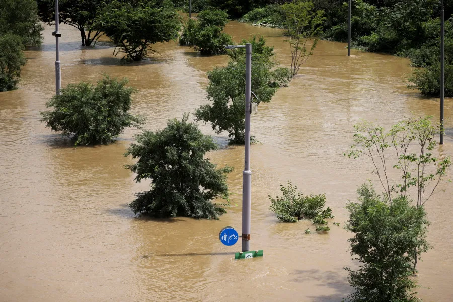 REUTERS: A general view of the Han River Park submerged by torrential rain at Han river in Seoul, South Korea August 10, 2022. REUTERS/Kim Hong-Ji