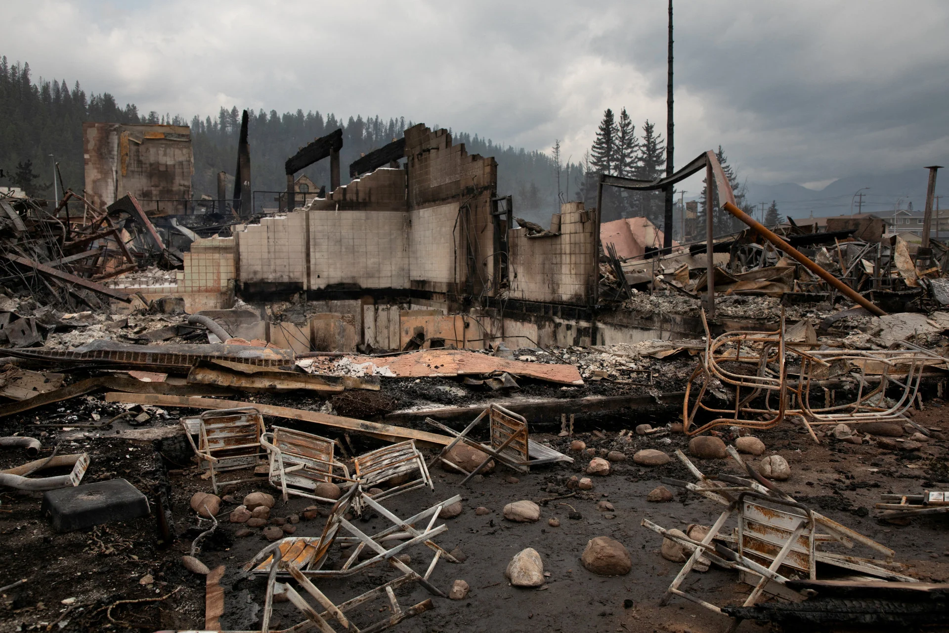 Reuters: FILE PHOTO: The remains of hotels in Jasper, Alberta, Canada, on Friday July 26, 2024. AMBER BRACKEN/Pool via REUTERS/File Photo