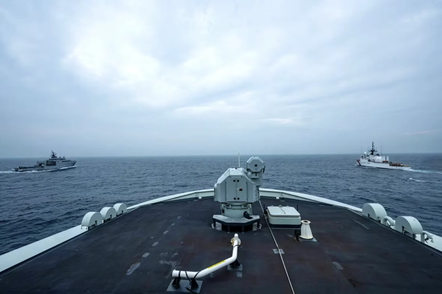 cbc: HMCS Harry DeWolf sailing between two allied ships. (Private Brendan Gamache/CAF Imagery Technician)